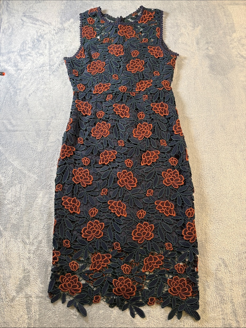 Sleeveless Navy Lace Sheath Dress with Rust Floral Appliquรฉ